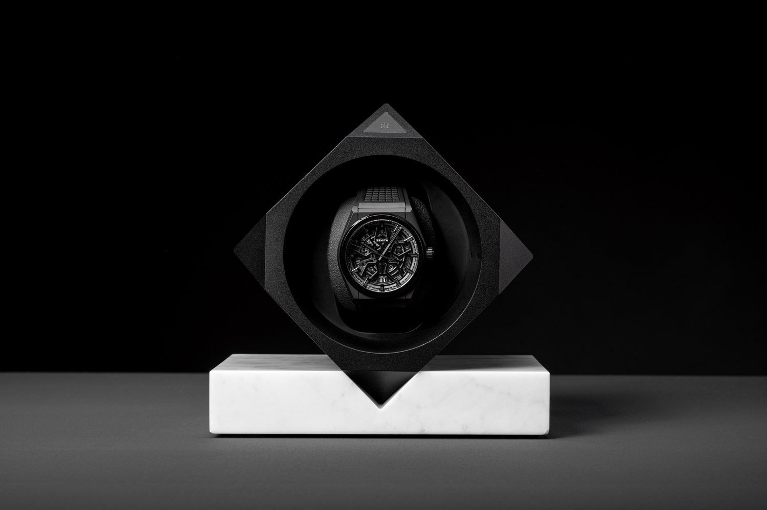 Single base watch winder by Time Machine Winders with a mounted Zenith automatic watch