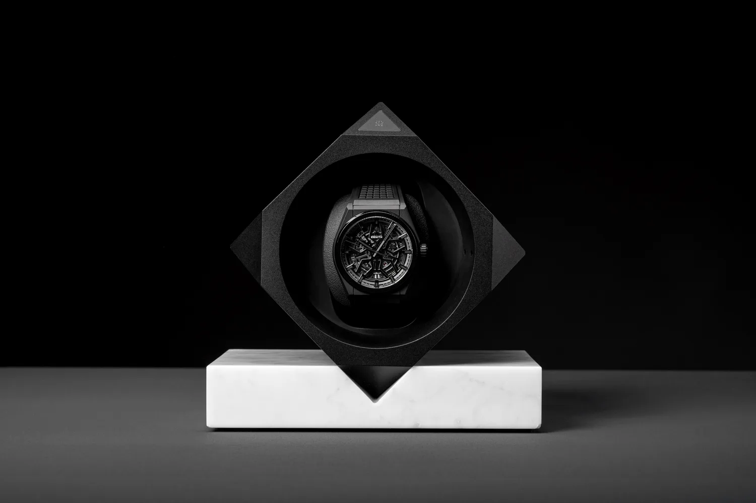 Single base watch winder by Time Machine Winders with a mounted Zenith automatic watch